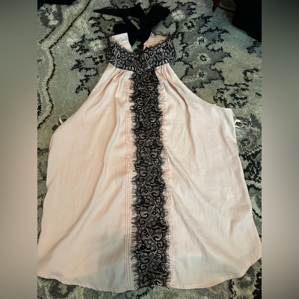 Elegant Pink Dress with Black Lace Detail